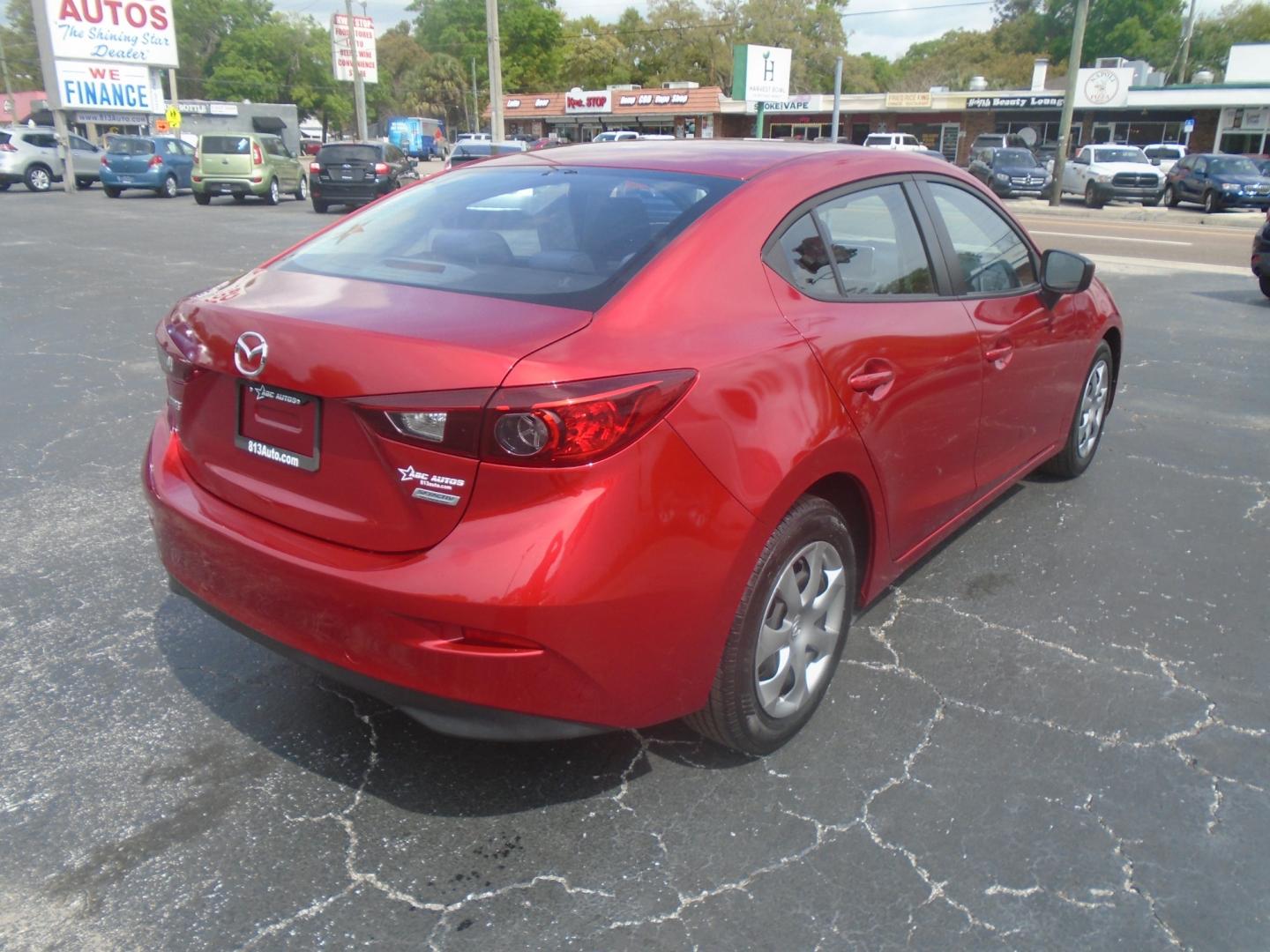 2016 Mazda MAZDA3 (JM1BM1T71G1) , located at 6112 N Florida Avenue, Tampa, FL, 33604, (888) 521-5131, 27.954929, -82.459534 - Photo#3